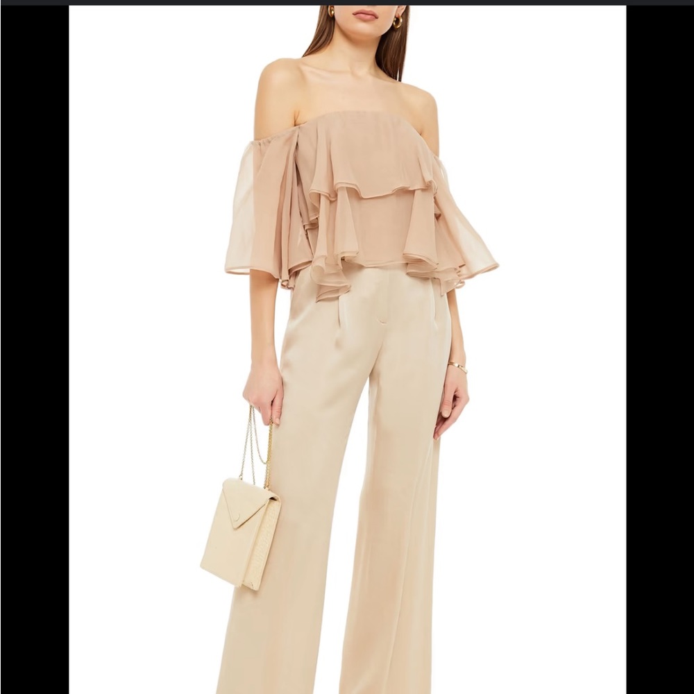 Brunello cucinelli top xs good condition 1 tear